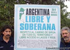 Pancarta en marcha por el libre acceso a lagos y ríos