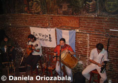 Typical "Peña" (spontaneous folklore music show) in a bar - Salta