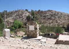 Tomb facing a family home - Northern Argentina