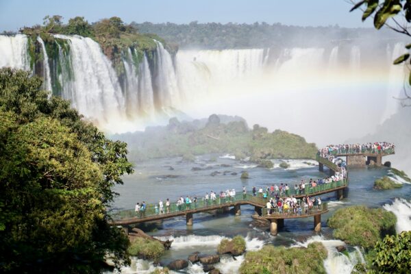 people walking on bridge in IGUAZU Falls